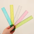 Brightly colored transparent plastic ruler