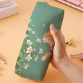 Green-background pencil case with cat and floral print